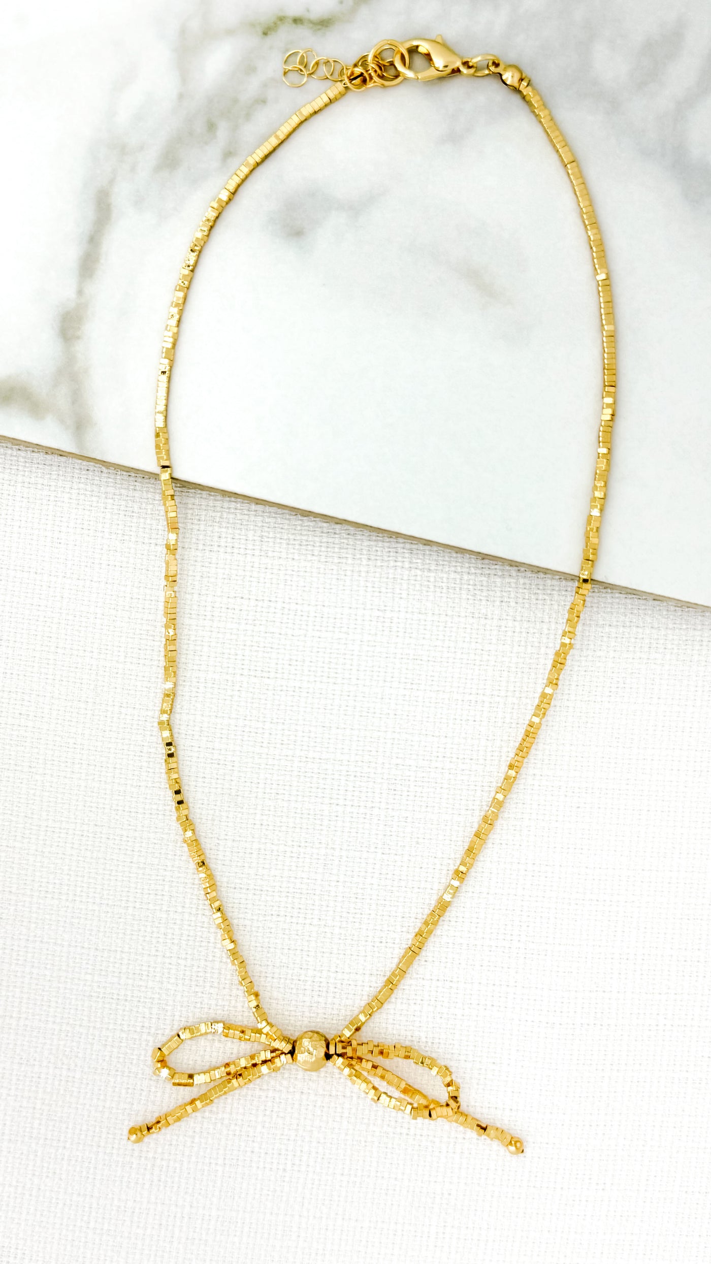 Gold Beaded Bow Necklace