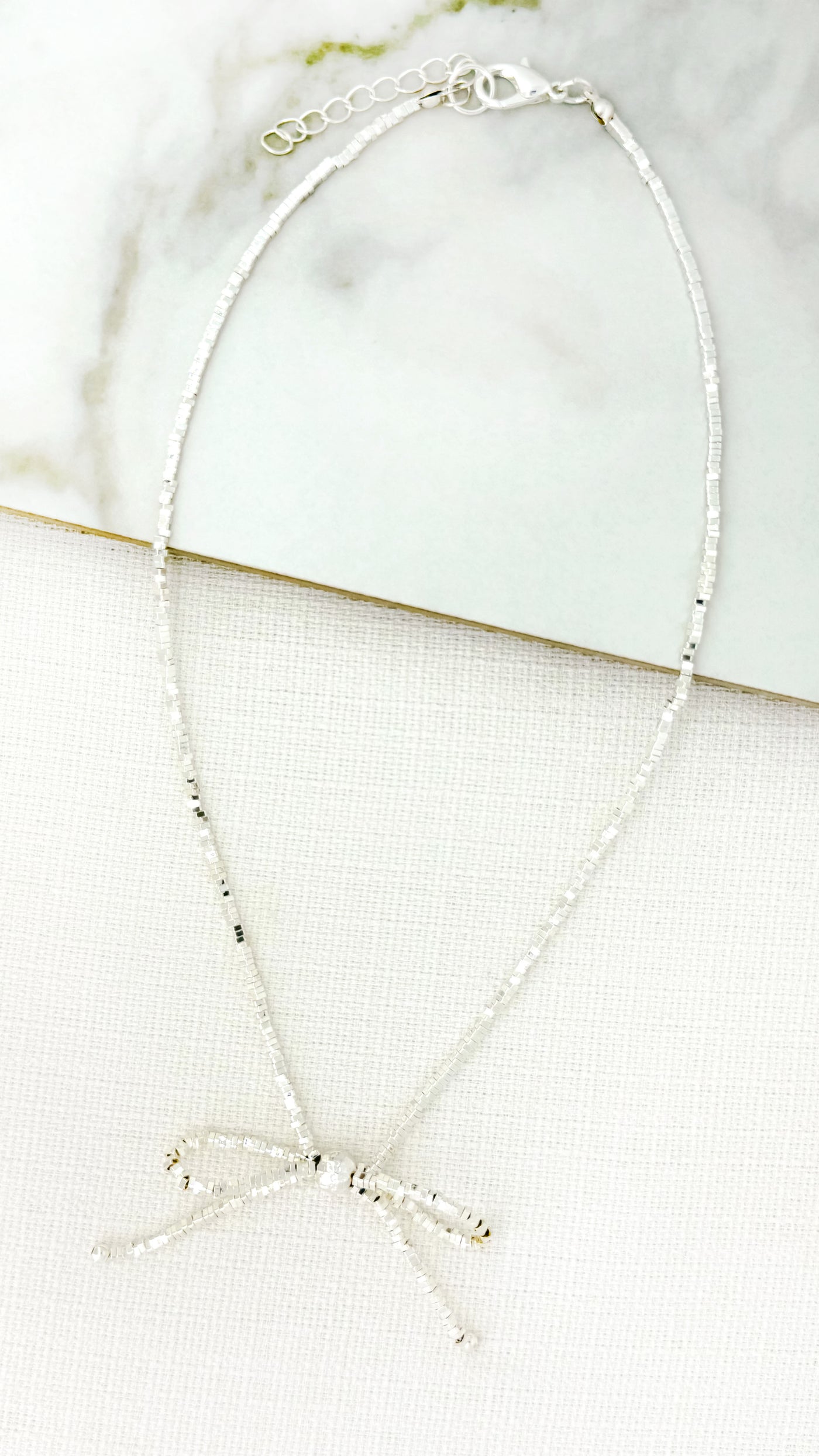 Silver Beaded Bow Necklace