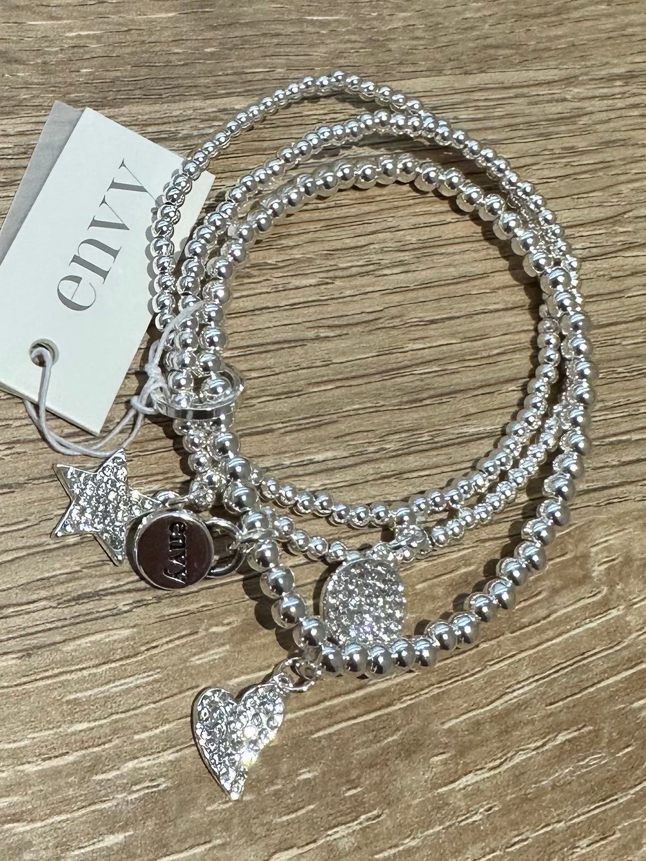 Silver Layered Multi Charm Bracelet