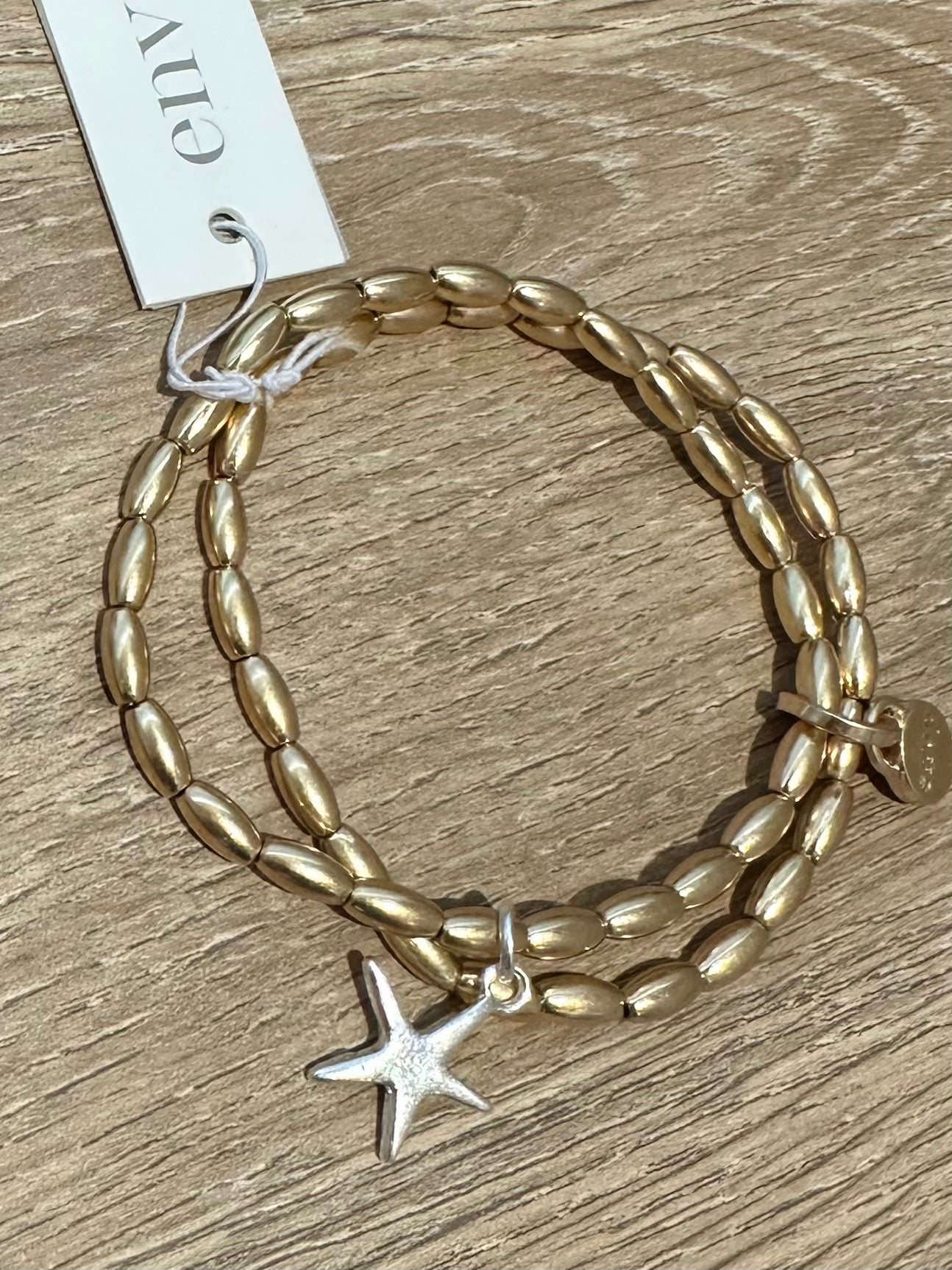 Gold Two Tone Star Charm Bracelet