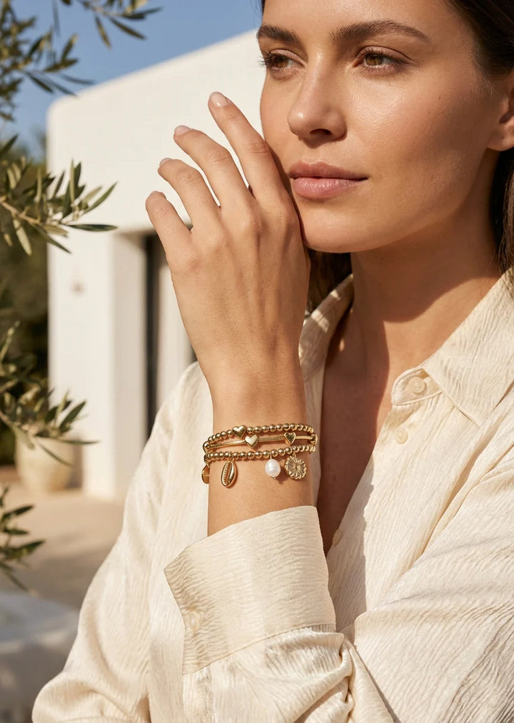 Layered Gold Heart & Shell Charm Bracelet