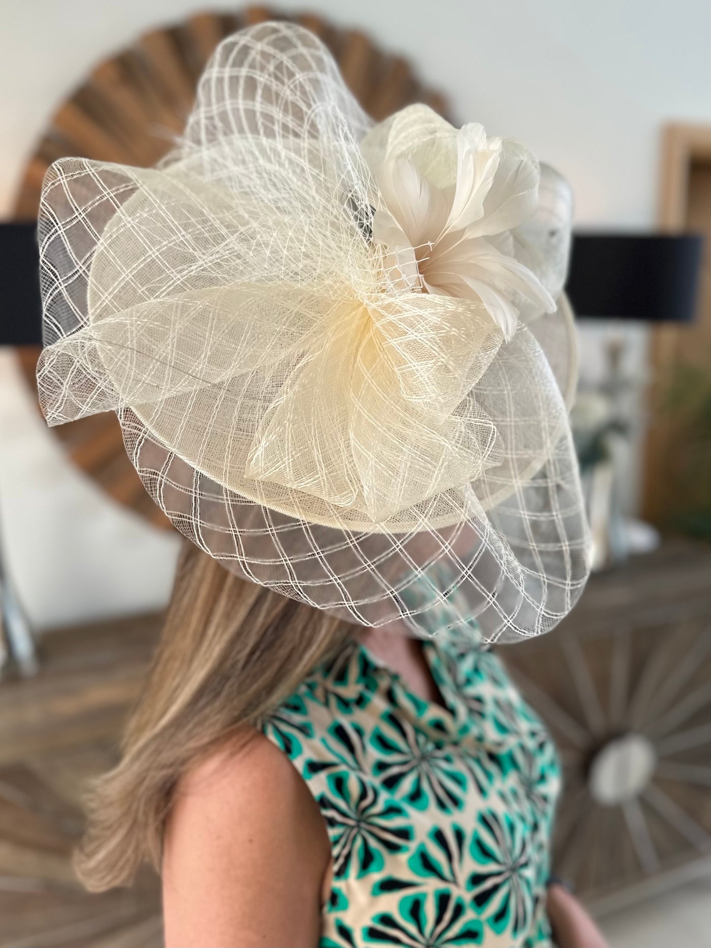 Cream Fascinator With Feathers
